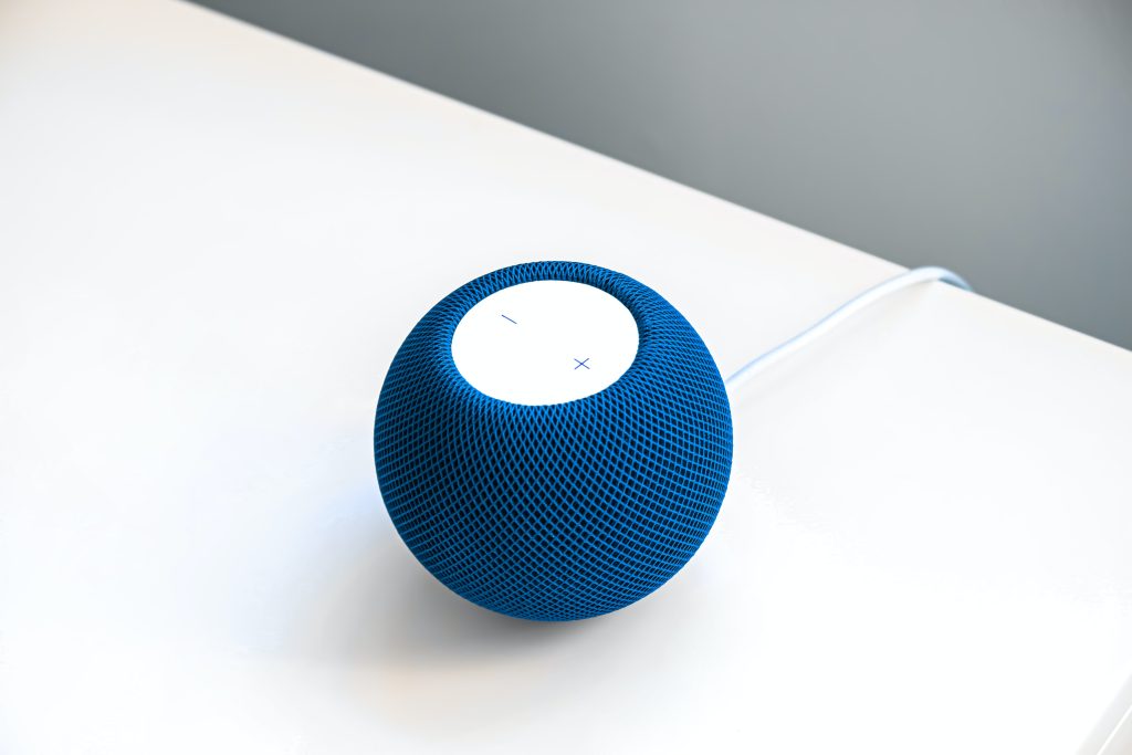 The Apple HomePod Mini on a desk.