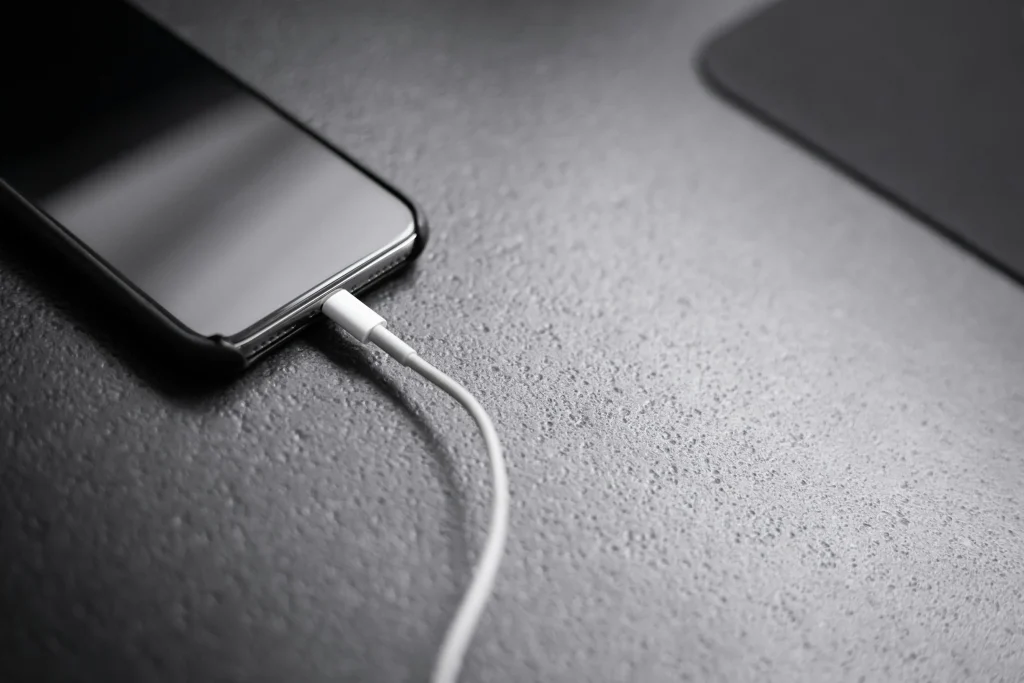 Man plugs 100 chargers into an iPhone at once to see if it gives it an instant charge