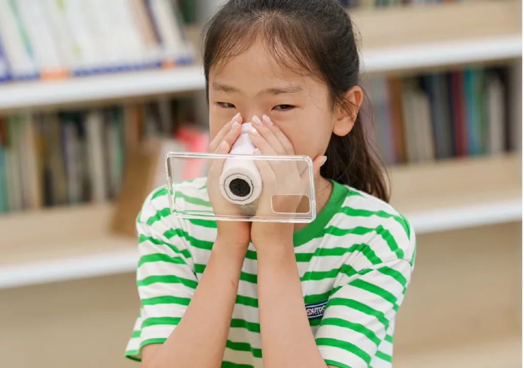 12-year-old student invents emergency breathing filter using an everyday phone grip to help people escape smoke