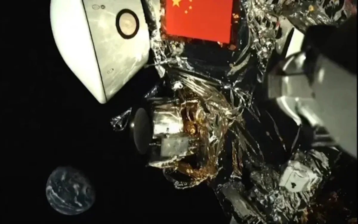 China's space probe which is halfway to asteroid grabs stunning selfie as Earth glows tiny in the background