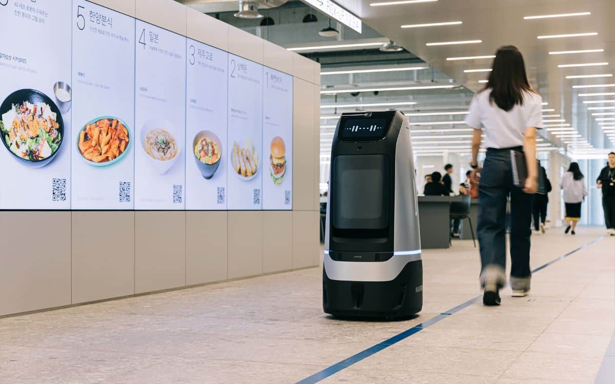 Robots roam freely at this 28-story robot-friendly building