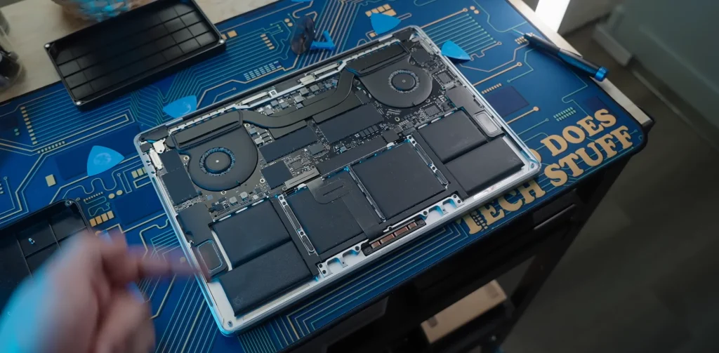 Man buys a 2018 MacBook Pro for $330 from Temu to see if it works as a budget laptop