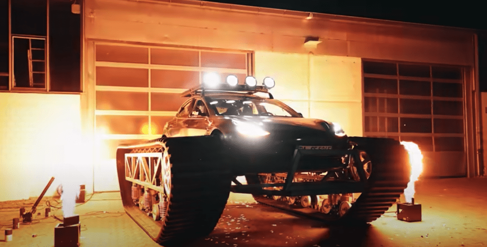 Flames surround the transformed off-roader.