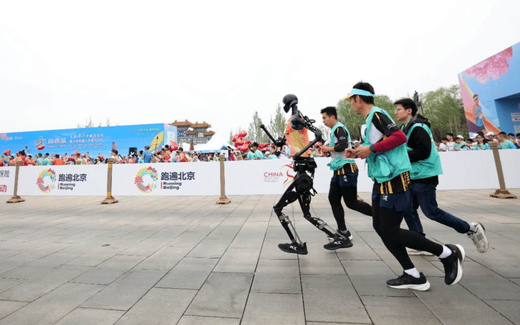 Humanoid robots race humans at a Chinese half marathon in world first