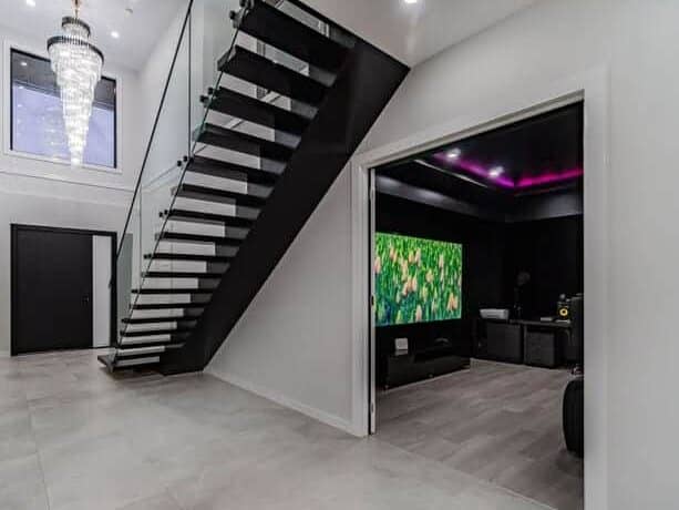 Staircase with chandeliere in Craigieburn home