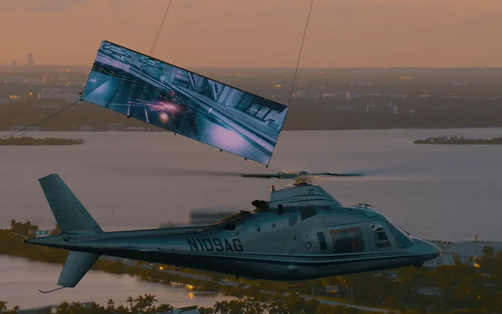 Xbox has flown two helicopters over Miami, carrying a massive 200+ foot TV and rapper Swae Lee, all to break one of the most bizarre gaming world records
