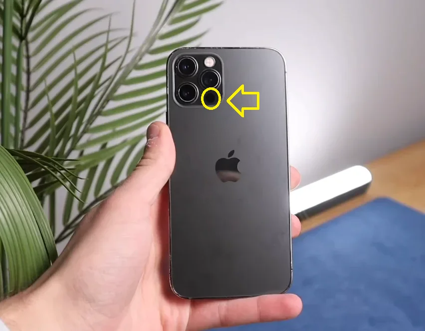 This is what the black dot on your iPhone camera is and what it actually does