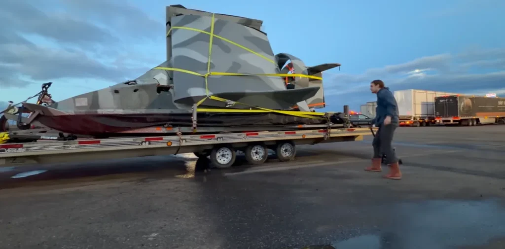 A one-of-one Navy hovercraft sends a YouTuber flying cross-country, and getting it home turns into something far stranger than expected.