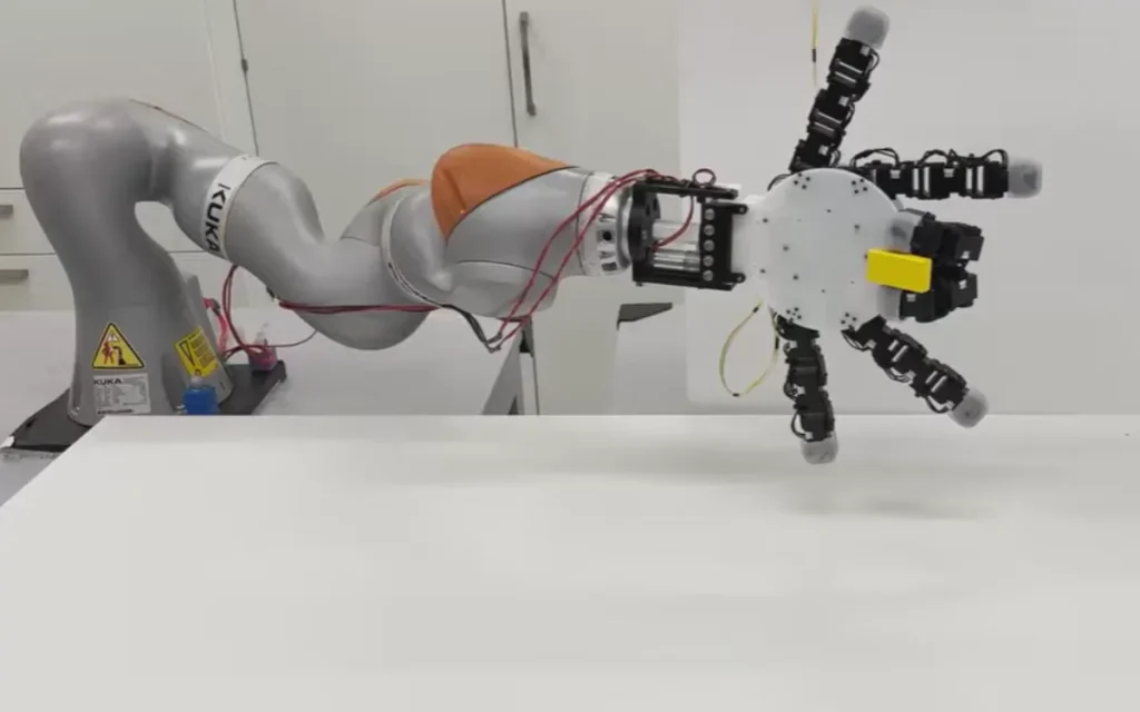 A creepy-cool robotic hand detaches from its arm, crawls like Thing from The Addams Family, and grabs objects all on its own