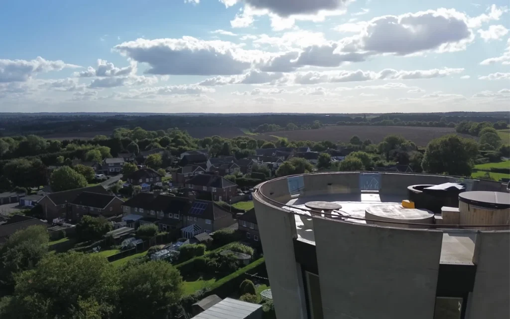 It takes a bold industrial designer to look past rust and concrete and turn a towering water tower into a truly quirky home.