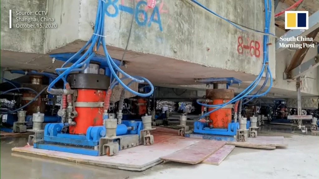An 85-year-old, 7,600-tonne building relocated 203ft in China by using 198 robotic legs