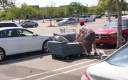 Marko parks the couch in a Walmart carpark. 