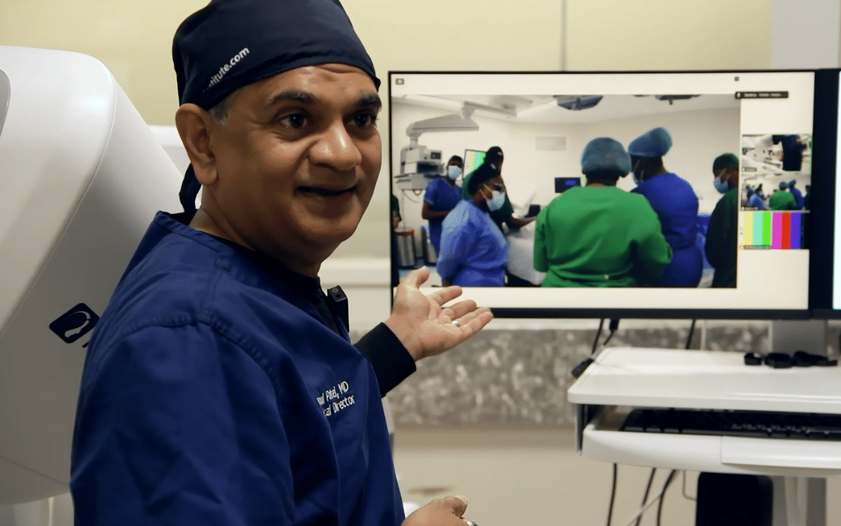 A Florida surgeon has removed cancer 7,000 miles away using remote-controlled robot