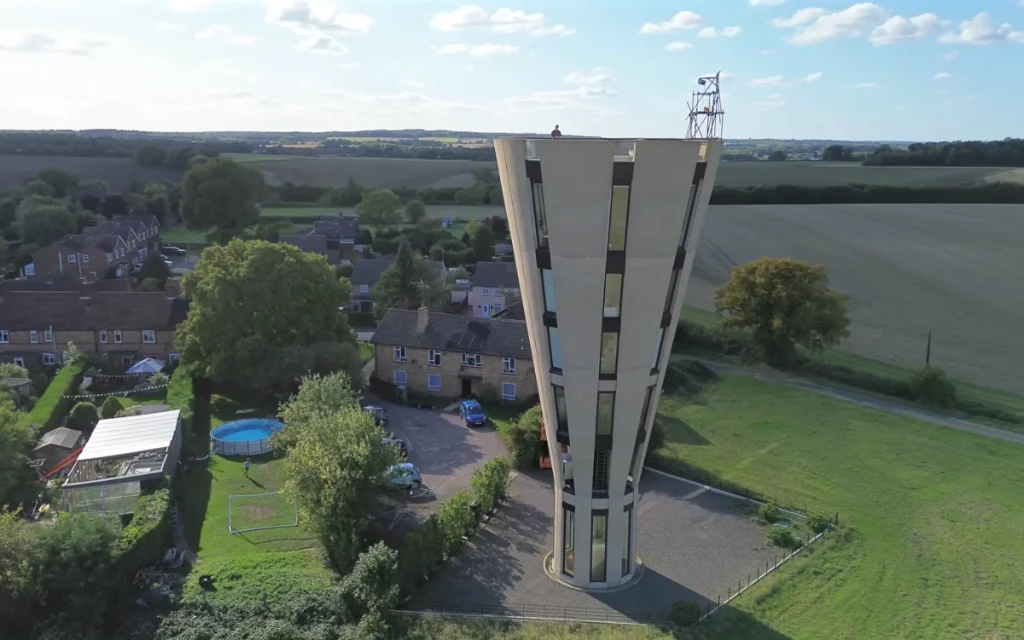 It takes a bold industrial designer to look past rust and concrete and turn a towering water tower into a truly quirky home.